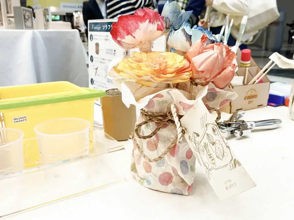 リアクト戦勝で染めたソラフラワーのフラワーアレンジメント